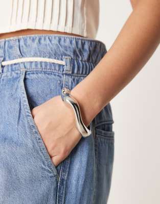 ASOS DESIGN ASOS DESIGN bangle bracelet in molten design in silver tone