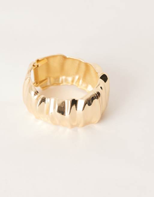 ASOS DESIGN bangle bracelet in ripple molten detail in gold tone, 3 of 3