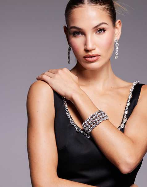 ASOS DESIGN bangle bracelet with all over crystal design in silver tone - view 1