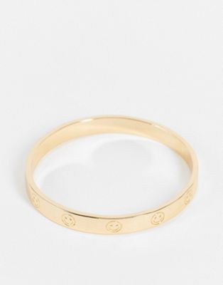 ASOS DESIGN bangle bracelet with happy face design in gold tone
