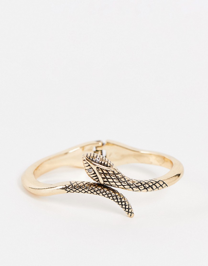 ASOS DESIGN bangle bracelet with snake design in gold tone