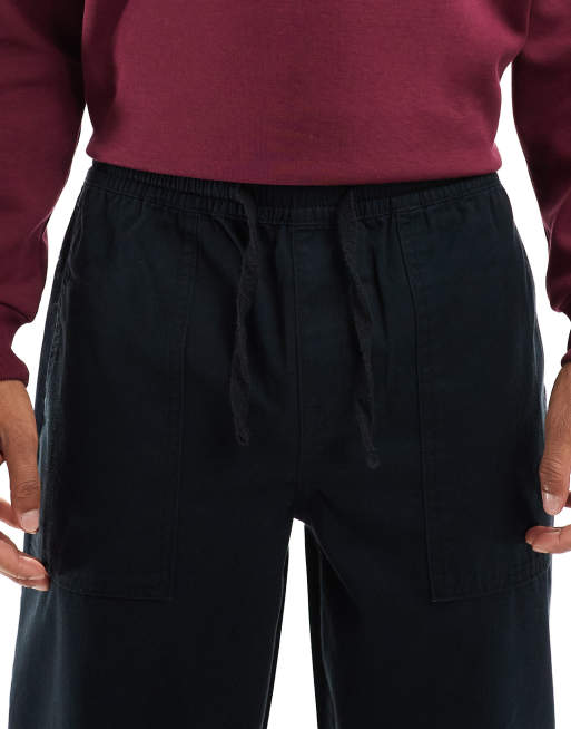ASOS DESIGN – Bardzo szerokie wciągane bojówki w spranym czarnym kolorze, 4 z 5