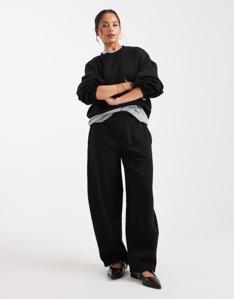 ASOS DESIGN barrel leg brushback trackies in black - view 1