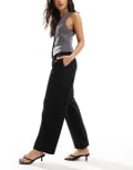 [ASOS DESIGN] ASOS DESIGN barrel leg pull on tailored pants in black 10 Black