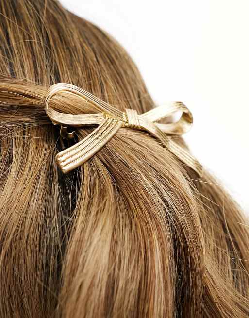 ASOS DESIGN barrette hair clip with bow detail in gold tone ASOS