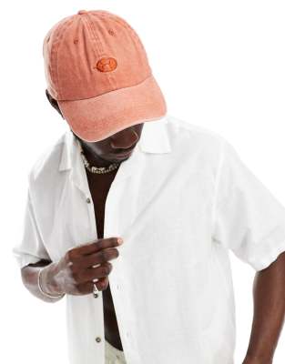 baseball cap with embroidery in washed orange