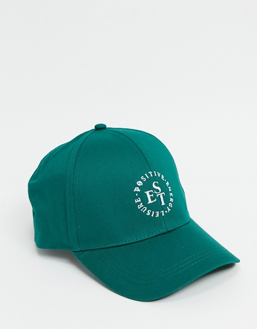 ASOS DESIGN baseball cap with logo in dark green