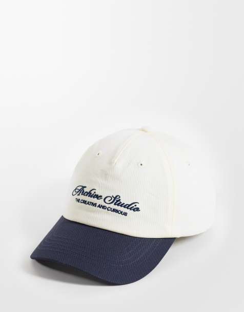 ASOS DESIGN baseball contrast cap with logo graphic in stone and navy - view 1