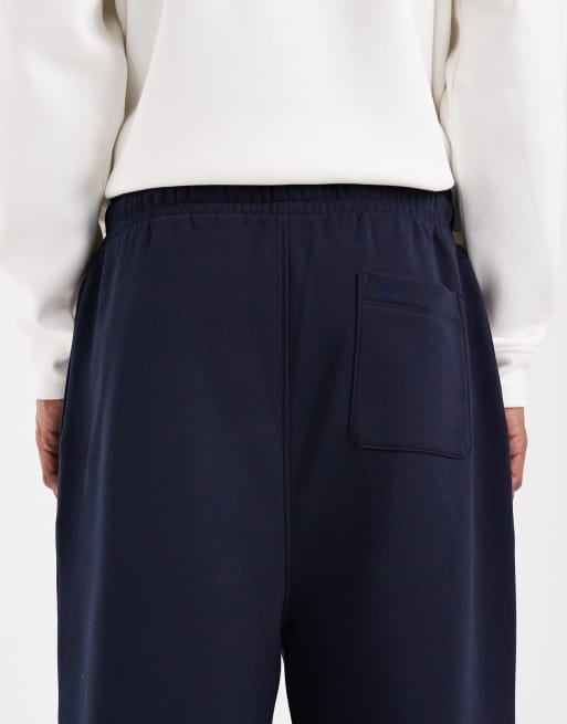 ASOS DESIGN – Basic-Jogginghose in Marineblau mit weitem Bein, 4 von 5