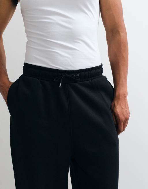 ASOS DESIGN – Basic-Jogginghose in Schwarz mit weitem Bein, 4 von 5