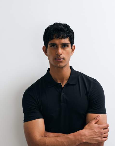ASOS DESIGN - Basic muscle fit polo in zwart - view 1