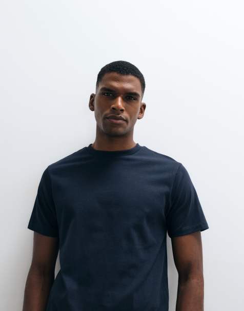 ASOS DESIGN - Basic muscle fit T-shirt in marineblauw - view 1