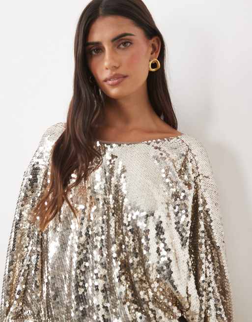 ASOS DESIGN batwing inspired mini dress with draped front bodice and tassel details in sequin in silver, 3 of 4