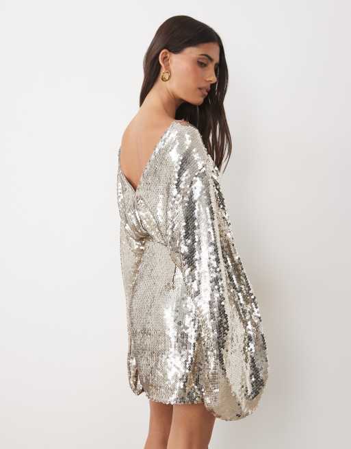 ASOS DESIGN batwing inspired mini dress with draped front bodice and tassel details in sequin in silver, 4 of 4