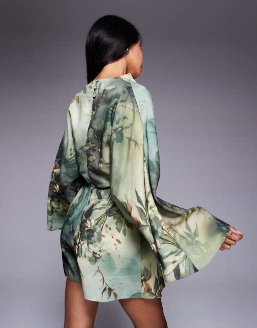 ASOS DESIGN batwing wrap high neck romper in green floral print