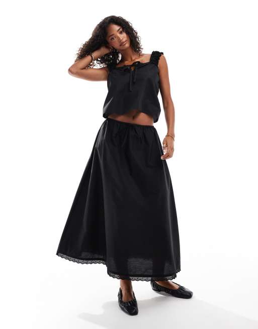 ASOS DESIGN – Baumwoll-Maxirock in Schwarz mit Kordelzug an der Taille und Lochstickerei-Besatz