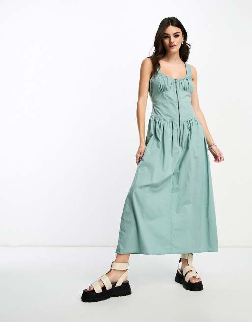 ASOS DESIGN – Bawełniana sukienka midi z zamkiem i obniżoną linią talii w stylu utility w spranym niebieskim kolorze  