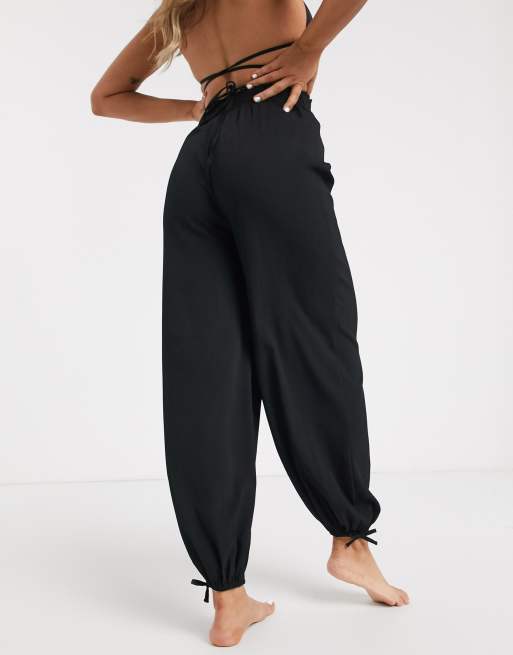 ASOS DESIGN beach harem pants in black crinkle