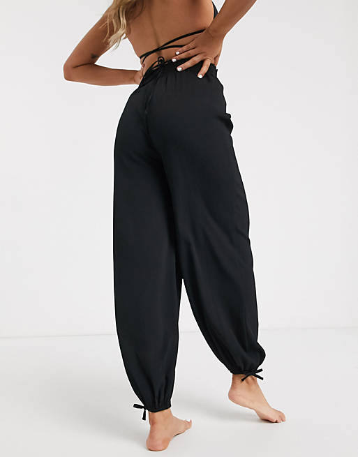 ASOS DESIGN beach harem trousers in black crinkle