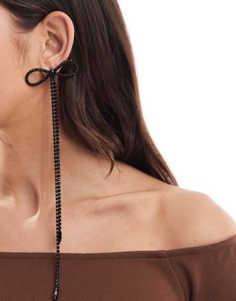 ASOS DESIGN beaded bow earrings in black - view 1