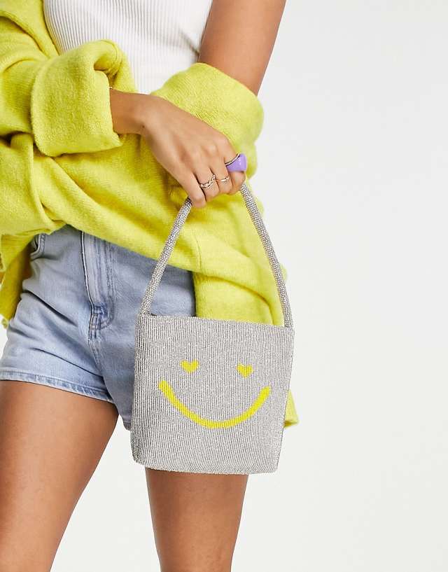 ASOS DESIGN beaded grab bag with happy face in silver