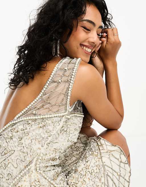 ASOS DESIGN beaded mini dress with layered skirt and linear ASOS DESIGN beaded mini dress with layered skirt and linear
