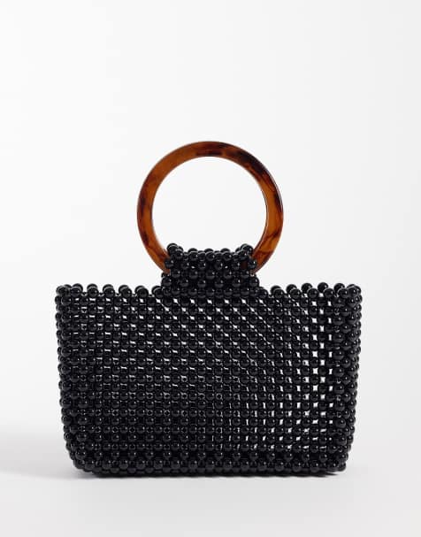 ASOS DESIGN beaded resin handle clutch bag in black - view 1
