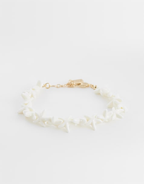 ASOS DESIGN beaded starfish bracelet in white - view 1