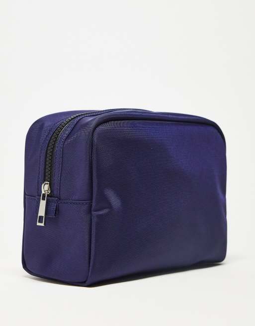 ASOS DESIGN - Beauty-case di medie dimensioni in nylon blu navy