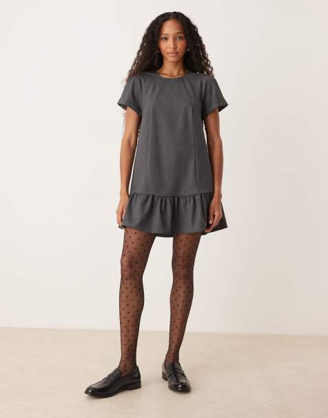 ASOS DESIGN – Beflockte Polka-Dot-Strumpfhose in Schwarz - view 1