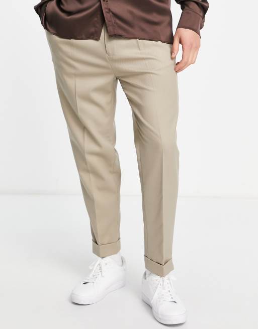 ASOS DESIGN – Beige avsmalnande finbyxor i twill