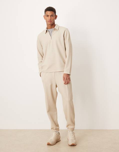 ASOS DESIGN – Beige, avsmalnande mjukisbyxor i pikétyg med stråveck, del av set - view 1