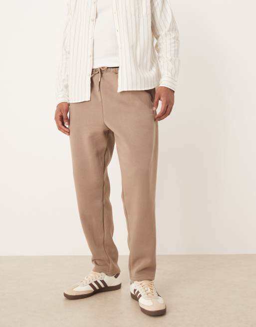 ASOS DESIGN – Beige, avsmalnande mjukisbyxor med avslappnad passform, del av set, 2 av 5