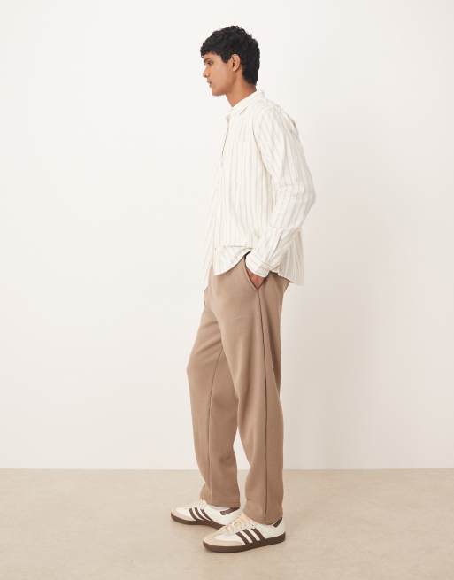ASOS DESIGN – Beige, avsmalnande mjukisbyxor med avslappnad passform, del av set, 3 av 5