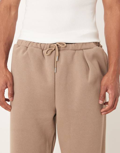 ASOS DESIGN – Beige, avsmalnande mjukisbyxor med avslappnad passform, del av set, 4 av 5