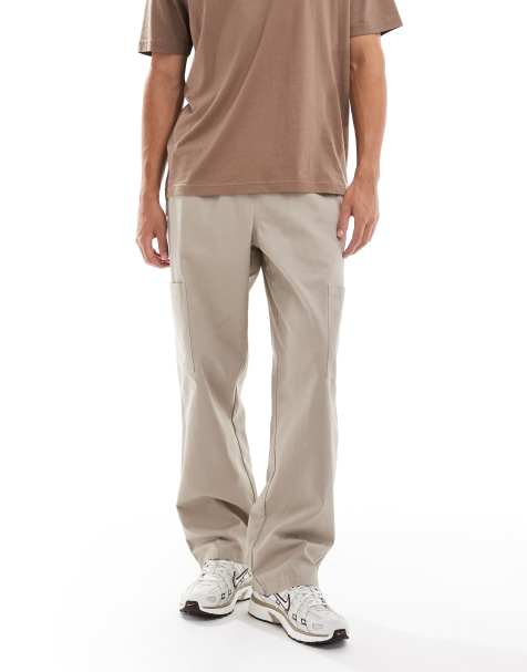 ASOS DESIGN – Beige cargobyxor i baggy-stil med dra på-design - view 1