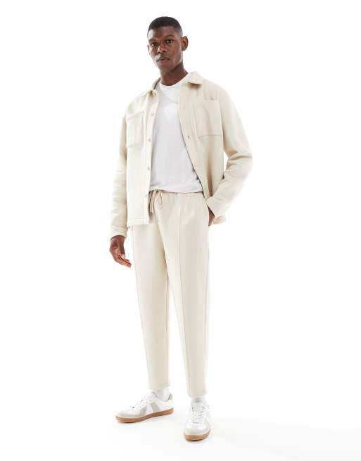 ASOS DESIGN - Beige joggingbukser med tapered fit og fast sømkant samt plisseringer, 2 af 5