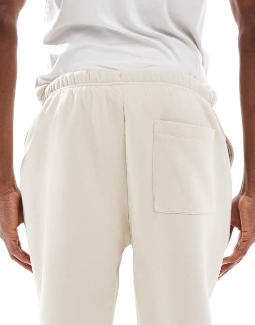 ASOS DESIGN - Beige joggingbukser med tapered fit og fast sømkant samt plisseringer, 4 af 5