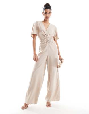 ASOS DESIGN – Beige jumpsuit med rysch framtill och utskurna detaljer baktill - view 1