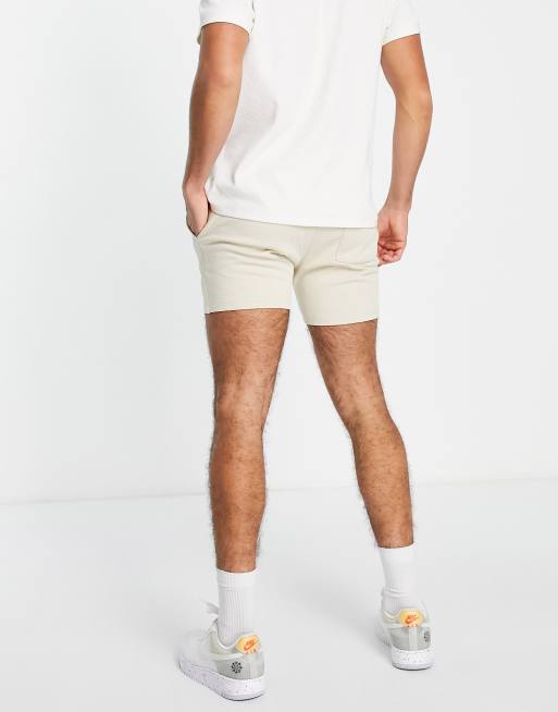 ASOS DESIGN – Beige/marinblå, skinny jersey-shorts i kortare längd, 2-pack, 3 av 4