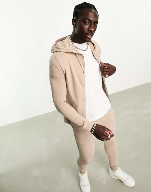 ASOS DESIGN – Beige träningsoverall i muscle fit med huvtröja med dragkedja och mjukisbyxor med extra smal passform