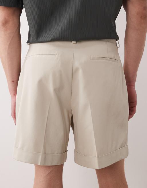 ASOS DESIGN – Beige, vida, figursydda shorts i twill med uppvikta ben, 4 av 5