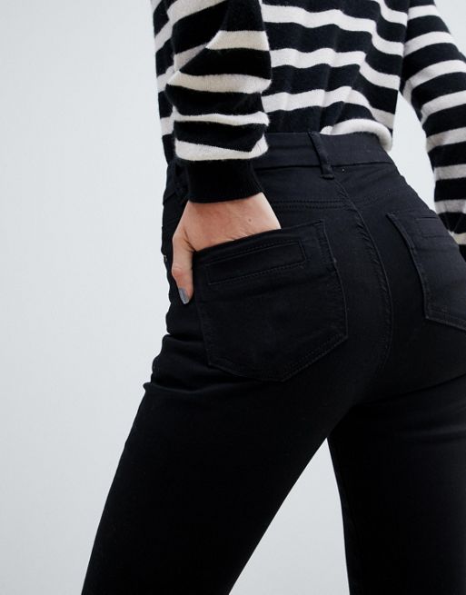 ASOS DESIGN bell flare jeans in clean black with pressed crease