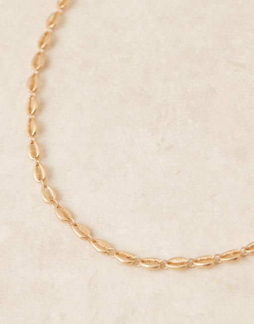 ASOS DESIGN belly chain in faux shell detail in gold tone, 2 of 3