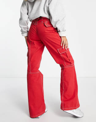 ASOS DESIGN belted cargo flare pants in red