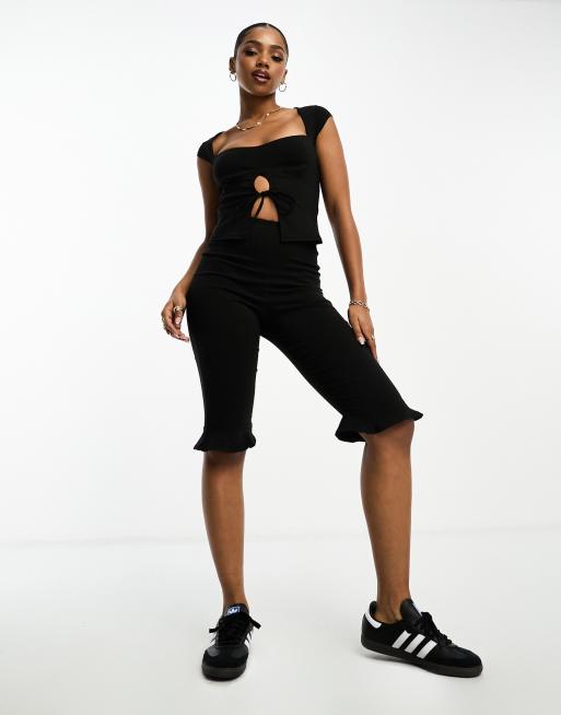 COLLUSION slim split hem capri pant in black