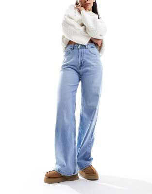 ASOS DESIGN - Bequeme weite Dad-Jeans in Mittelblau