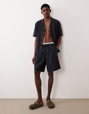ASOS DESIGN - Bermuda d'ensemble texturé coupe mi-longue - Noir