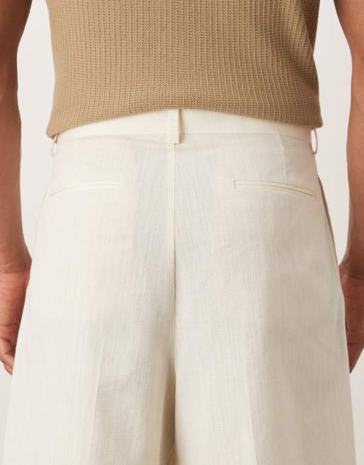 ASOS DESIGN smart bermuda shorts in yellow texture