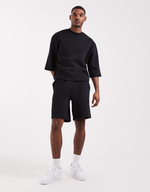ASOS DESIGN - Coordinato nero con pantaloncini in jersey taglio lungo e felpa a maniche corte comoda, 2 di 3